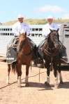 pickup men Brad Marshall and Joe Blankenship on their horses